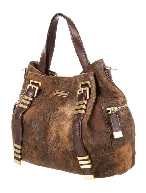 my michael kors leather purse does not have a lining|Michael Kors distressed leather handbags.